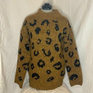 Leopard print, knit, oversized sweater.